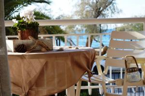A balcony or terrace at Luxury Beach Apartment in Athens Riviera