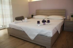 Кровать или кровати в номере LE COLONNE MILANO