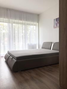 Кровать или кровати в номере Exclusive Home