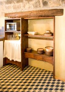 A kitchen or kitchenette at Casa Mur de Alujan