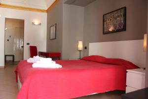 Posteľ alebo postele v izbe v ubytovaní B&B Opera