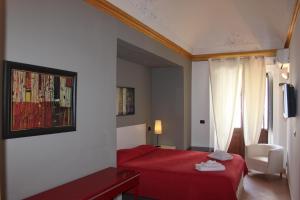 Posteľ alebo postele v izbe v ubytovaní B&B Opera