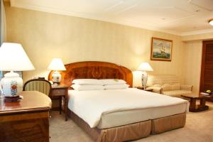 Voodi või voodid majutusasutuse Evergreen Laurel Hotel Taipei toas