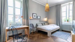 เตียงในห้องที่ Landhotel & Restaurant Walsers