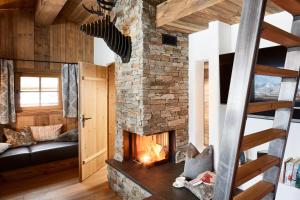 Postel nebo postele na pokoji v ubytování Promi Alm Flachau - Luxus Chalets