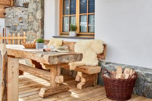 Posezení v ubytování Promi Alm Flachau - Luxus Chalets