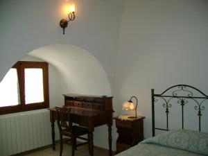 Postel nebo postele na pokoji v ubytování Masseria Cassiere