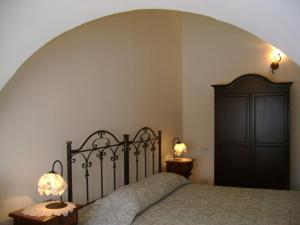 Postel nebo postele na pokoji v ubytování Masseria Cassiere