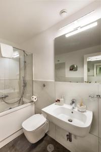 Ванная комната в Hotel Art Resort Galleria Umberto