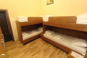 Voodi või voodid majutusasutuse Moon Hostel toas