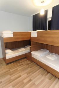 Voodi või voodid majutusasutuse Moon Hostel toas