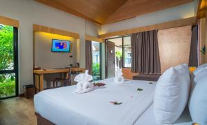 TV a/nebo společenská místnost v ubytování Weekender Resort