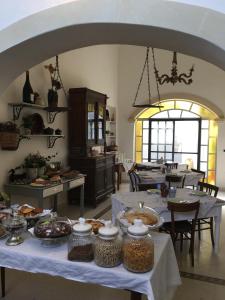 Restoran või mõni muu söögikoht majutusasutuses Palazzo De Castro
