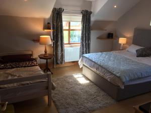 Postel nebo postele na pokoji v ubytování Tobernaglough Wexford pet friendly country b&b