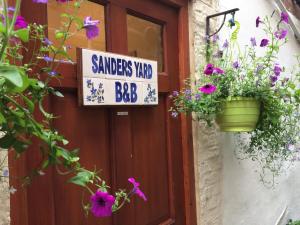 Certifikát, hodnocení, plakát nebo jiný dokument vystavený v ubytování Sanders Yard