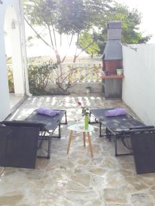 Patio nebo venkovní prostory v ubytování Josip