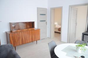 Posteľ alebo postele v izbe v ubytovaní Multi Apartment Łąkowa 18/13