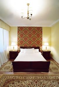 Voodi või voodid majutusasutuse Tumar Hotel toas