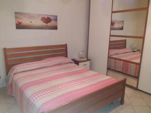Posteľ alebo postele v izbe v ubytovaní LE RIVE - Soggiorno/Vacanza a TUFO (Avellino)