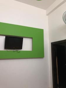 TV a/nebo společenská místnost v ubytování An Ngọc Linh Hotel