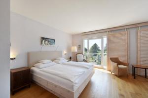 Postel nebo postele na pokoji v ubytování Hotel Hirschen in Freiburg-Lehen