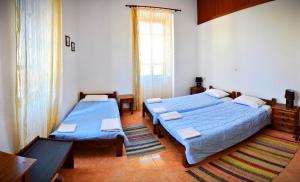 A bed or beds in a room at Nymph