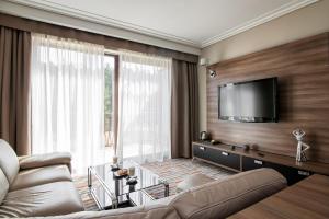 TV a/nebo společenská místnost v ubytování Hotel Kawallo