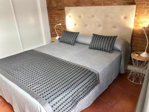 Postel nebo postele na pokoji v ubytování Teixidors de Palomar - PalomarGroup
