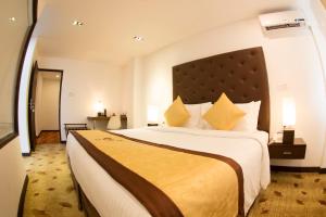 Posteľ alebo postele v izbe v ubytovaní City Hotel Colombo 02