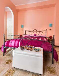 
A bed or beds in a room at La Villa
