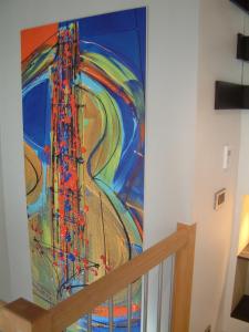 a painting of a tower on a wall at Hotel Villa d'Elsa in Juan-les-Pins