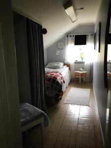 Postel nebo postele na pokoji v ubytování Det Gamla Panget