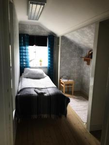 Postel nebo postele na pokoji v ubytování Det Gamla Panget