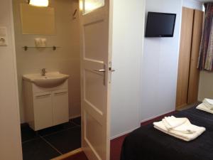 Ванная комната в Hotel Anna
