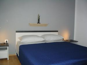 Posteľ alebo postele v izbe v ubytovaní Apartment Amfora on the ground floor
