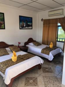 Voodi või voodid majutusasutuse Hostal Sandrita toas