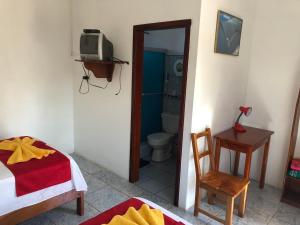 Voodi või voodid majutusasutuse Hostal Sandrita toas