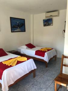 Voodi või voodid majutusasutuse Hostal Sandrita toas