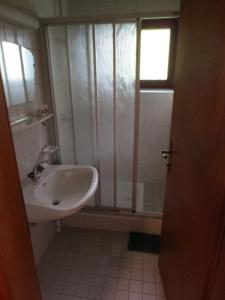 Kúpeľňa v ubytovaní Alpenhäusl