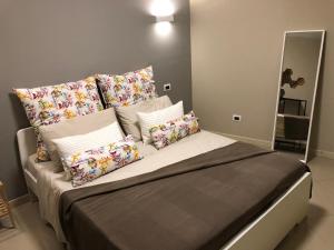 A bed or beds in a room at Giader's House - Free Parking