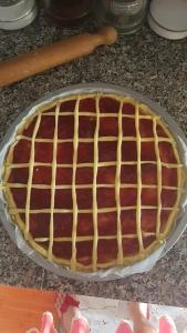 a chocolate cake in a pie pan on a counter at Agriturismo La Pietraia in Poppi