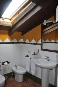 Ein Badezimmer in der Unterkunft Pensión Solís