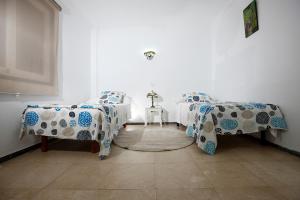 Posteľ alebo postele v izbe v ubytovaní Tabaiba Sea Views Apartment II