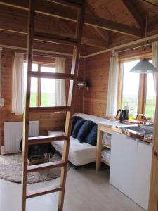 Posezení v ubytování Sjónarholl Cottage