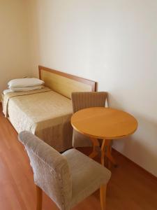 Postel nebo postele na pokoji v ubytování Omega Flat