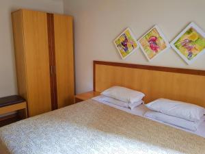 Postel nebo postele na pokoji v ubytování Omega Flat