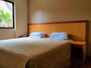 Postel nebo postele na pokoji v ubytování Omega Flat