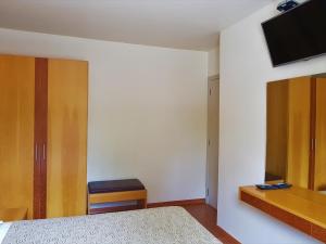 TV a/nebo společenská místnost v ubytování Omega Flat