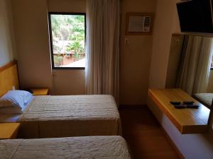 Postel nebo postele na pokoji v ubytování Omega Flat