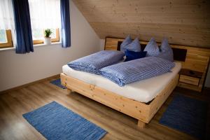 Postel nebo postele na pokoji v ubytování Ferienhaus Schleinzer